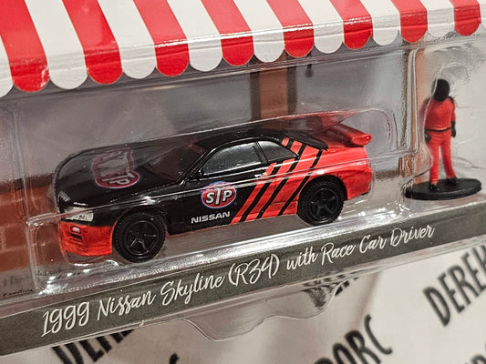 GreenLight Collectibles STP 1999 Nissan Skyline R34 with Race Car Driver Hobby Shop Series 13