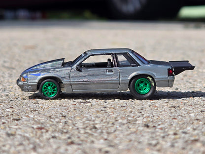 GreenLight Collectibles WRAPS Raw Chase 1990 Ford Mustang Store Exclusive